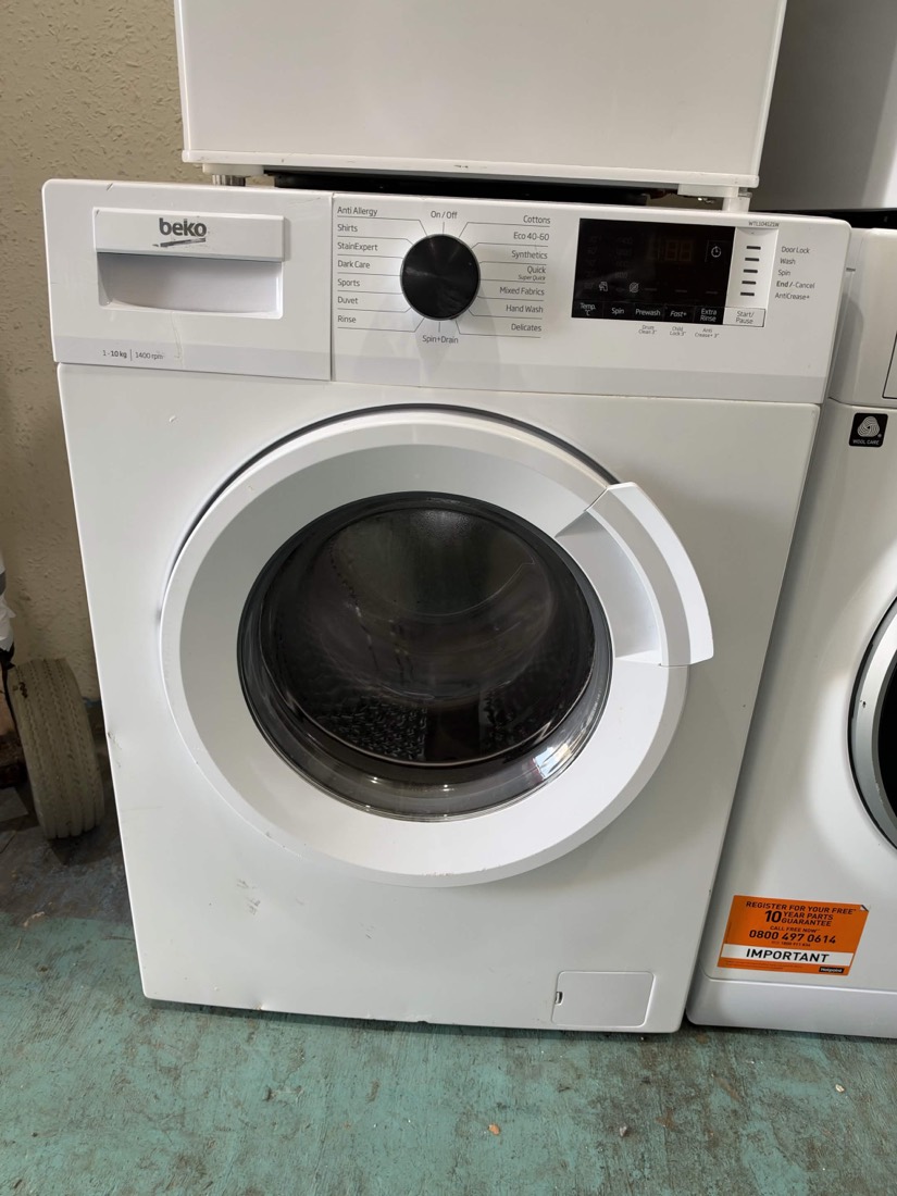 A Beko washing machine, an example of the brand and condition we typically carry